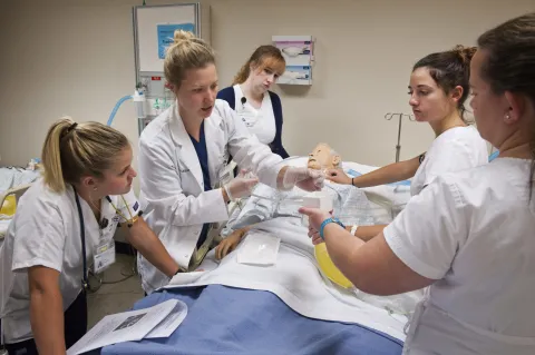 Students working in the simulation center on UCCS campus