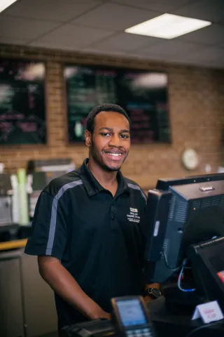 Student Employee working at the coffee shop